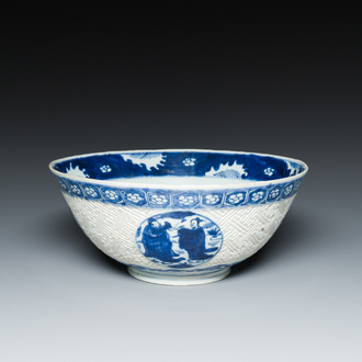 A Chinese blue and white 'Shou Lao' bowl with carved exterior, Chenghua mark, Wanli
