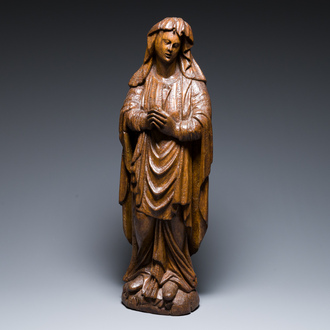 A Flemish carved oak figure of Mary Magdalen from a Crucifixion group, 16th C.
