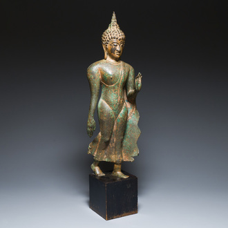 A large Thai partly gilt bronze sculpture of Buddha, probably Sukhotai period, 15th C.