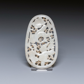 A Chinese reticulated white jade plaque, Qing