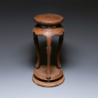 A Chinese wood circular incense stand with mythic animals, 'xiangji', Ming