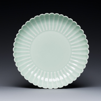 A Chinese celadon-glazed chrysanthemum-shaped plate, Qianlong mark, 20th C.