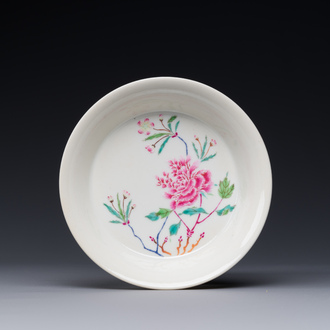 A Chinese famille rose 'peony' plate, Yongzheng mark and possibly of the period