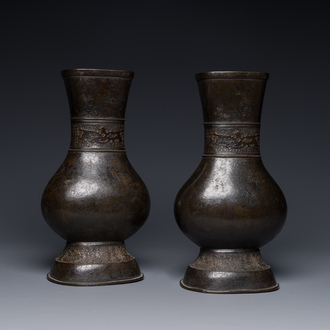A pair of Chinese bronze 'hu' vases with Taotie design, Song/Yuan