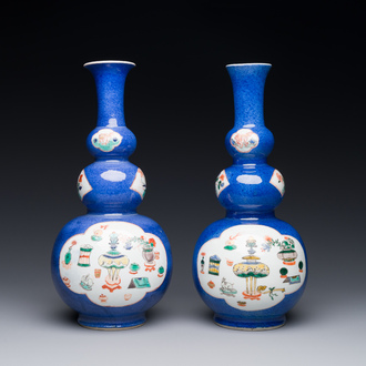 A pair of Chinese famille verte powder-blue-ground triple gourd 'antiquities' vases, Kangxi