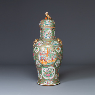 A large Chinese Canton famille rose vase and cover with narrative design, 19th C.