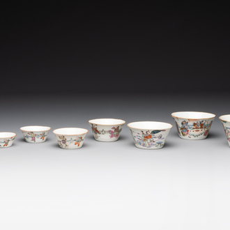 A rare set of eight Chinese famille rose 'Sanxing' nesting bowls, Tongzhi mark and of the period