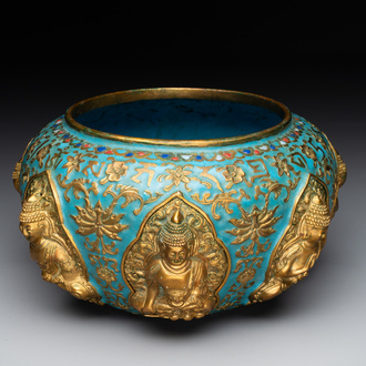 A Chinese gilt and champlevé enamelled bronze bowl with Buddhas in relief, 19/20th C.