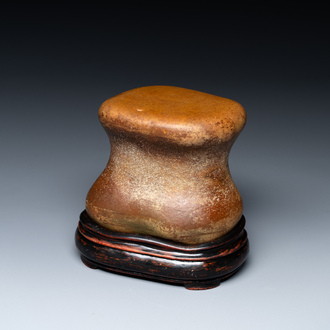 A Chinese scholar's rock on wooden stand, Ming or later