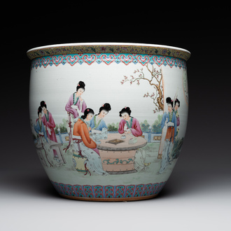A Chinese famille rose jardiniere with ladies in a garden, 20th C.