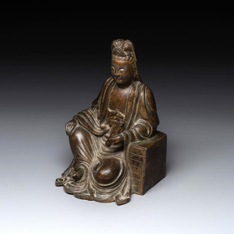 A rare Chinese parcel-gilt and lacquered pewter Guanyin, 17/18th C.