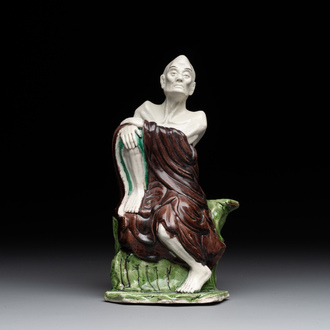 A fine Chinese sancai-glazed figure of a Luohan, Qianlong