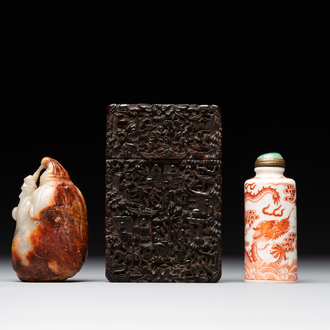 A Chinese jade carving, a tortoiseshell card holder and an iron-red snuff bottle, 19th C.
