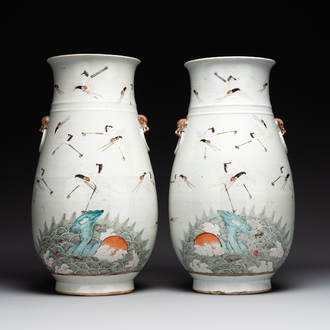 A pair of Chinese famille rose vases with cranes, 19th C.