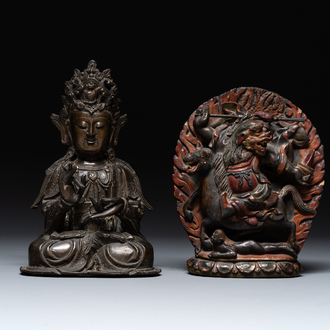 A Chinese bronze Guanyin, Ming and a Tibetan polychrome plaster relief, 19th C.
