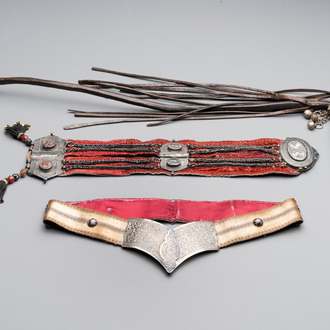 A gold lame woman's belt, a breast ornament and a silver karwat, Caucasus and Afghanistan, 19th C.