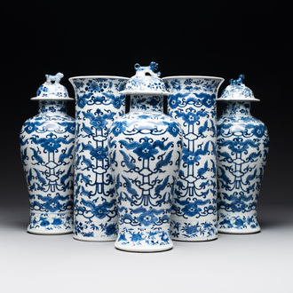 A Chinese blue and white garniture of five vases with lotus scrolls, 19th C.
