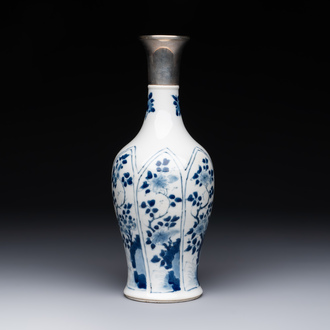 A Chinese blue and white silver-mounted vase with floral design, Kangxi
