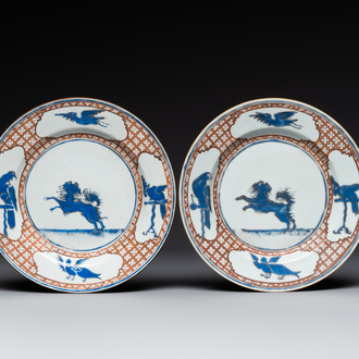 A pair of Chinese 'leaping pekinese' plates, possibly after a design by Cornelis Pronk, Qianlong, ca. 1740