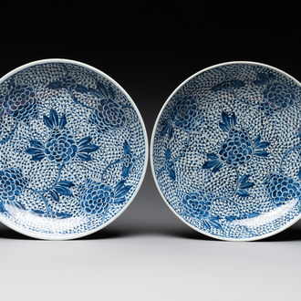 A pair of Chinese blue and white 'peony' dishes, Chenghua mark, 19th C.