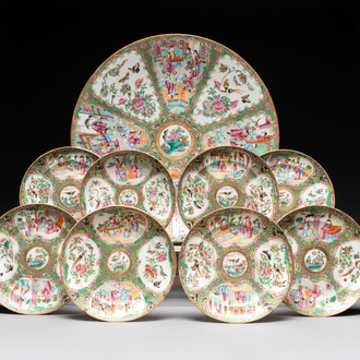 A large Chinese Canton famille rose dish and eight plates, 19th C.