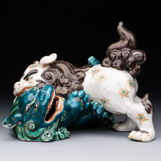 A Japanese polychrome-glazed group of playing Buddhist lions, 18/19th C.