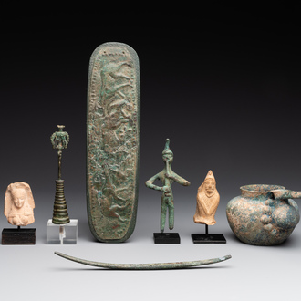 A group of seven bronze and pottery objects, Syria, Persia, and Luristan, 3rd C. and earlier