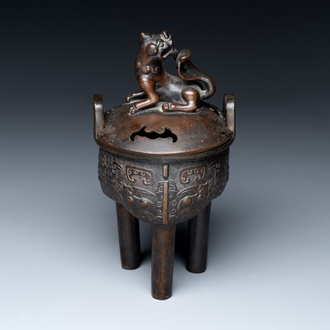 A fine Chinese bronze censer and cover with a Buddhist lion, 'ding 鼎', Xuande Mark, Ming