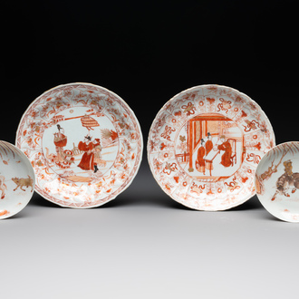 A pair of Chinese iron-red saucers and two plates, Kangxi/Yongzheng