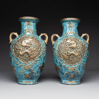 A pair of Chinese robin's egg and faux bronze-glazed 'hu' vases, Qianlong mark, 19th C.