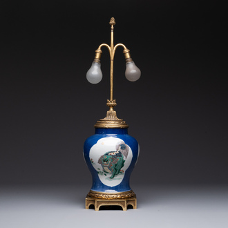 A Chinese famille verte  powder-blue-ground 'mythical animal' vase with gilt bronze lamp mounts, 19th C.
