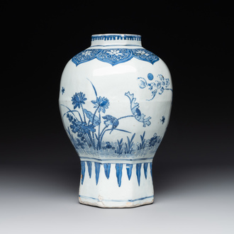 A Chinese octagonal blue and white 'birds and flowers' vase, Transitional period