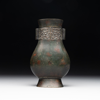 A Chinese silver-inlaid bronze arrow vase with Taotie design, 'touhu 投壺', Ming