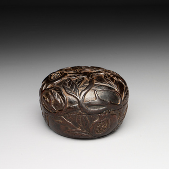 A Chinese huanghuali wooden box and cover with pomegranate design, 17/18th C.