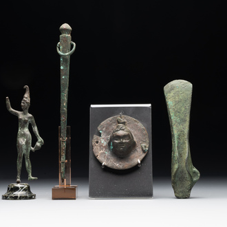 A varied collection of four bronze objects and figures, Roman Empire, 8th C. B.C./3rd C.