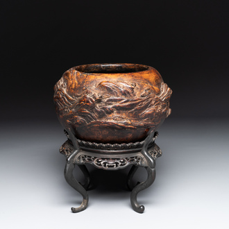 A Chinese agarwood brush washer with landscape relief design on wooden stand, 17/18th C.