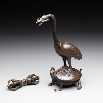 A Chinese bronze candle or incense holder in the shape of a crane standing on a turtle and a Tibetan vajra, Ming/Qing