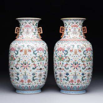 A pair of Chinese famille rose vases with floral design, Jiaqing mark, 19/20th C.