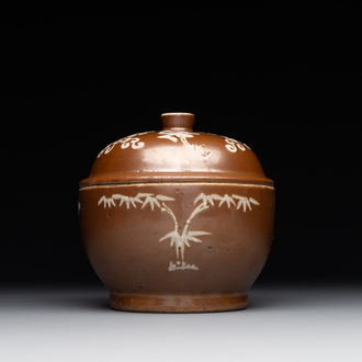 A Chinese slip-decorated brown-glazed 'three friends of winter' bowl and cover, Zhushan kilns, late Ming