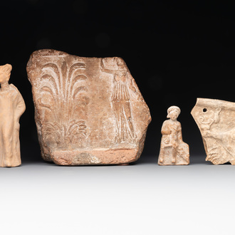 Two terracotta female figures and two fragments with figural design, Italy, 7/4th C. B.C.