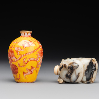 A Chinese jade snuff bottle and a yellow-ground iron-red snuff bottle, Daoguang mark, 19th C.