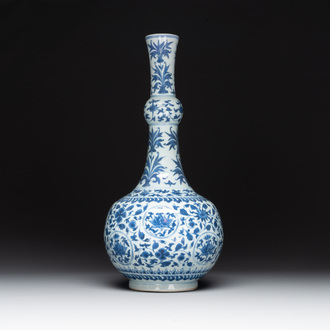 A Chinese blue and white 'lotus scroll' bottle vase, Transitional period