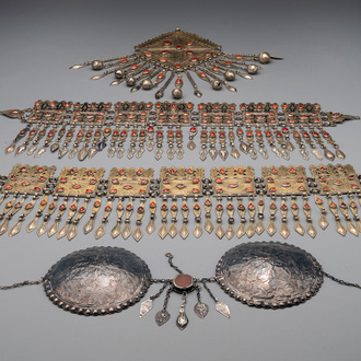 Three silver head ornaments and a chest ornament, Turkmenistan, 19/20th C.