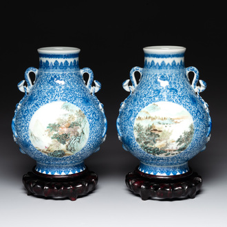 A pair of Chinese famille rose 'hu' vases with fine landscapes, Qianlong mark, Republic