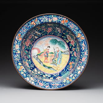 A large Chinese Canton enamel basin with figures in a landscape, Jiaqing