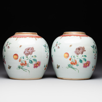A pair of fine Chinese famille rose 'botanical Merian-style' jars with wooden covers, Qianlong