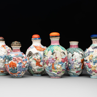 Six Chinese moulded famille rose snuff bottles, Qianlong mark, 19th C.