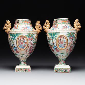 A rare pair of Chinese Canton famille rose export urns, 19th C.