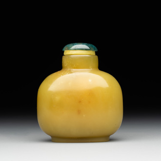 A Chinese yellow jade snuff bottle with moss agate cover and bone stopper, 19th C.