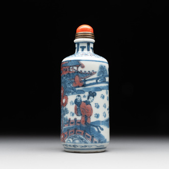 A Chinese blue, white and copper-red snuff bottle, Kangxi mark, 19th C.